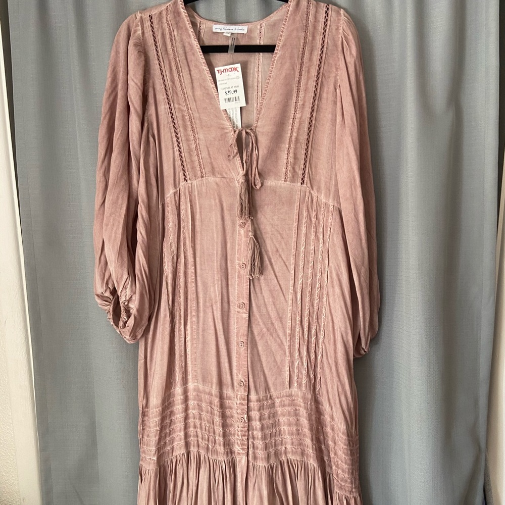 Women’s midi length dress.